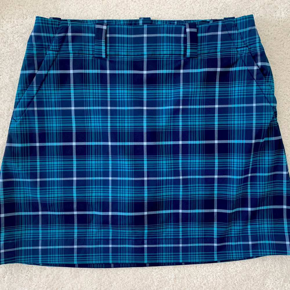 Nike Dri-Fit teal/navy blue/white plaid golf skort, size 6. Excellent condition.
